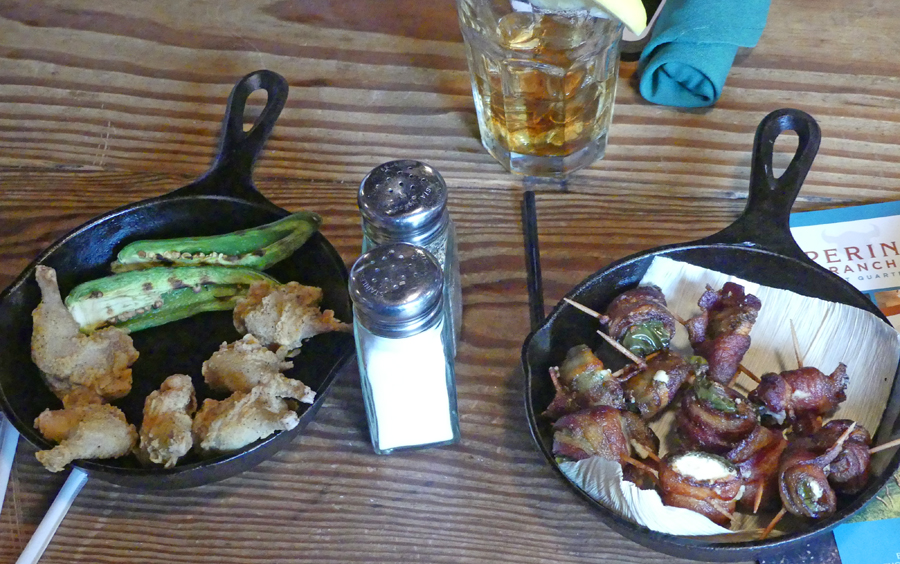 Jalepeno
                                      Bites and Quail legs served in
                                      small cast iron pans