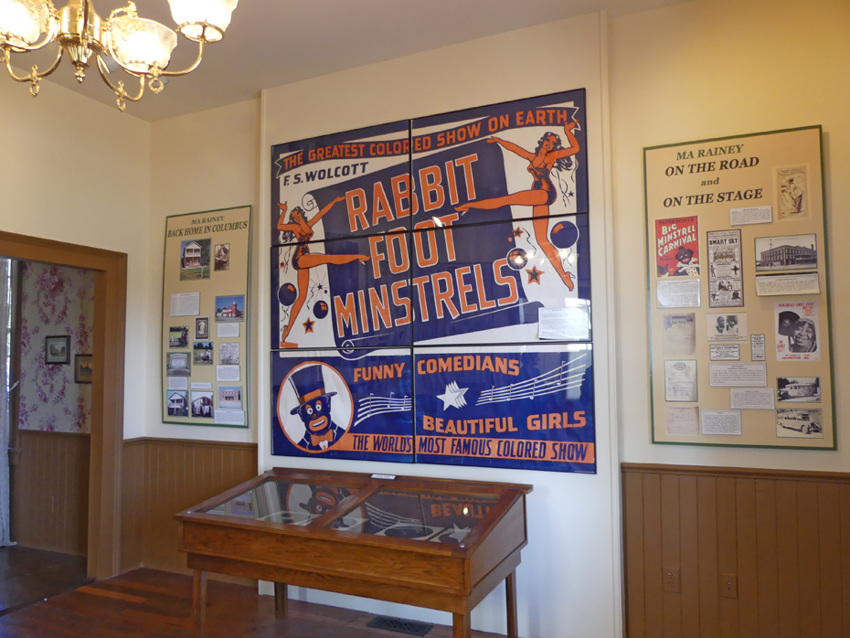 posters in Ma Rainey;s house mainly one for Rabbits Foot Minstrals