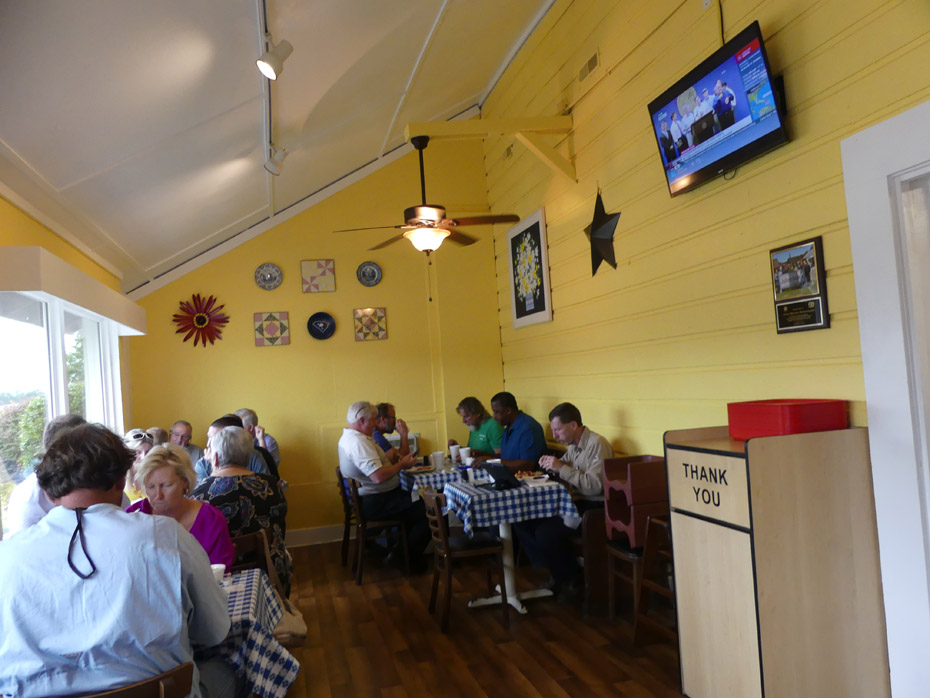 Diners seated at several tables at Julia Belle's in Pee Dee State Farmers Market