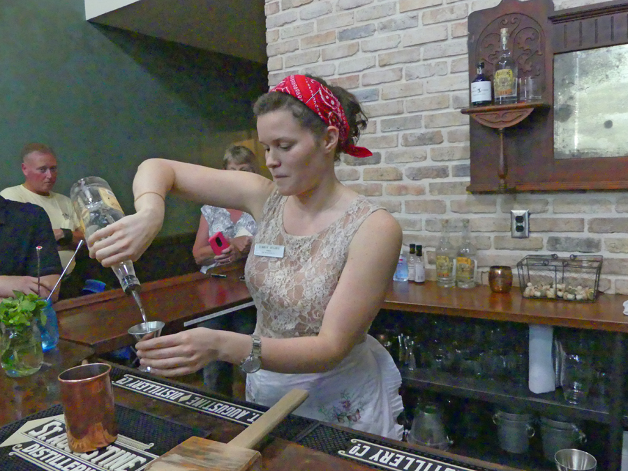 Guide mixes drinks at St. Augustine Distillery