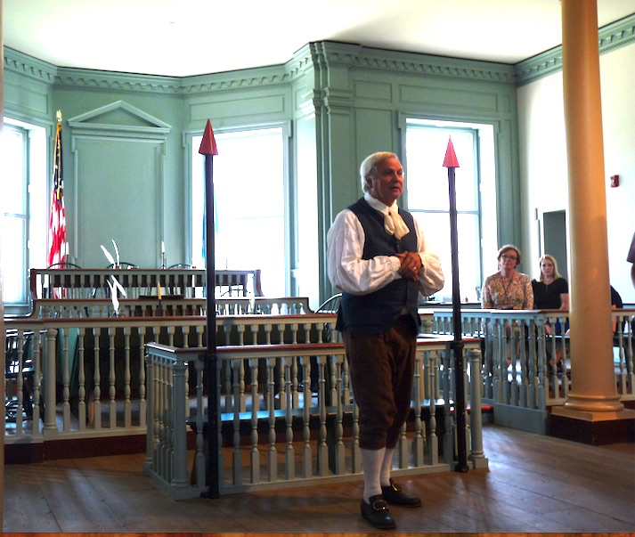 Male Reenactor Dover at Old Statehouse courtroom magistrate’s bench