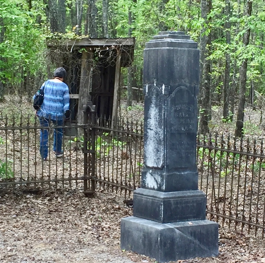 Outhouse and tombstone at New Smyrna Church