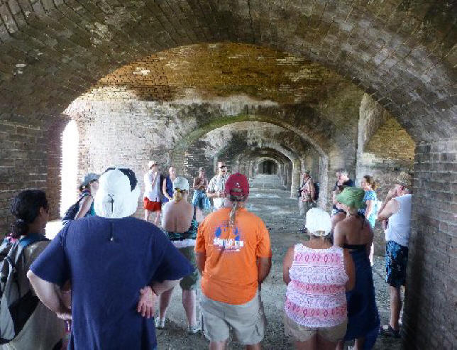 Tour guid and visiters inside fort Jefferson on Dry Tortugas