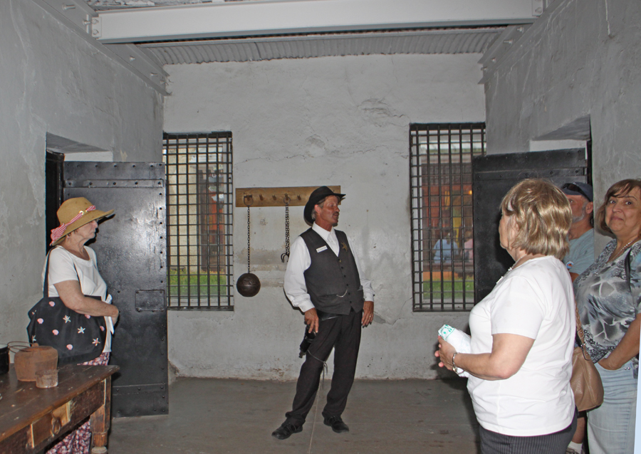 Visiters and docent Inside ofOld Jail  in St. Augustine, FL