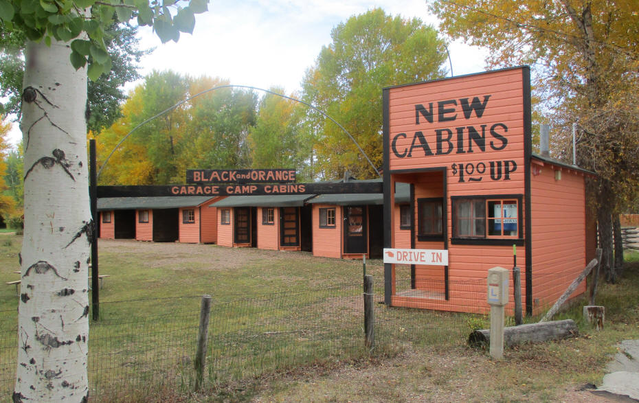 tiny house oragge wiht black trim