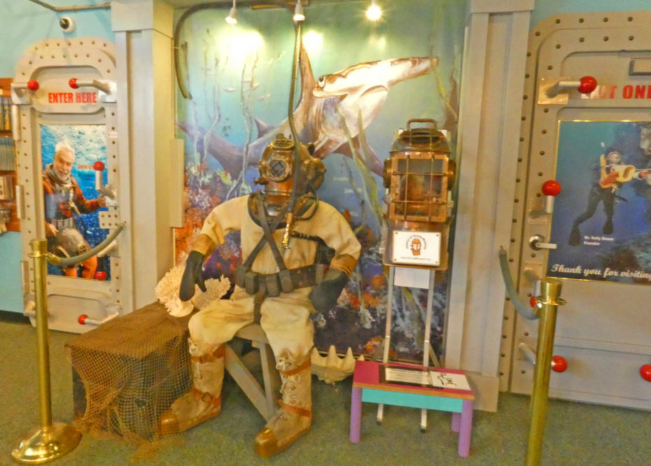 exhibit at diving museum of diver and helmut vistors can wear for a selfie