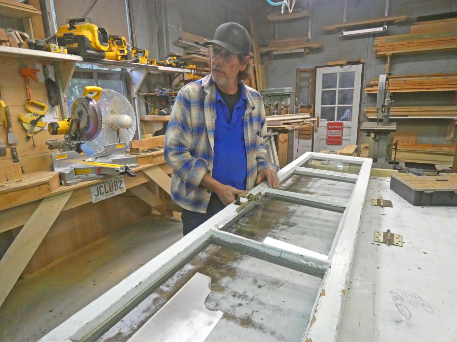 Ed working on historic door.