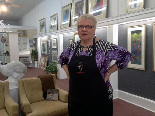 Lou Ann Zimmerman displays the art in  her gallery