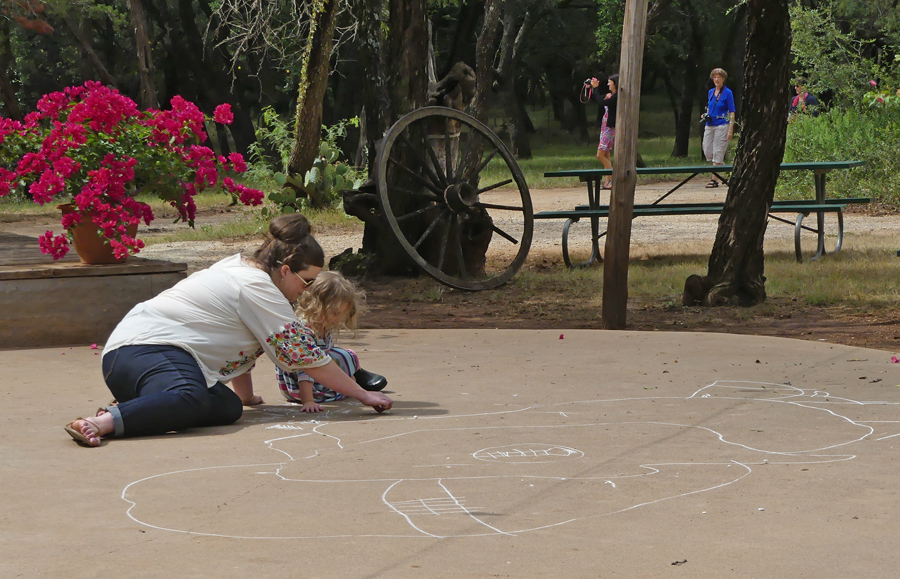 Mother and
                                      chiild enjoying the backyard area
                                      at Perini Ranch Steakhouse