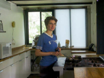 Worker in Grow Dat Youth Farm's test kitchen in New Orlkeans