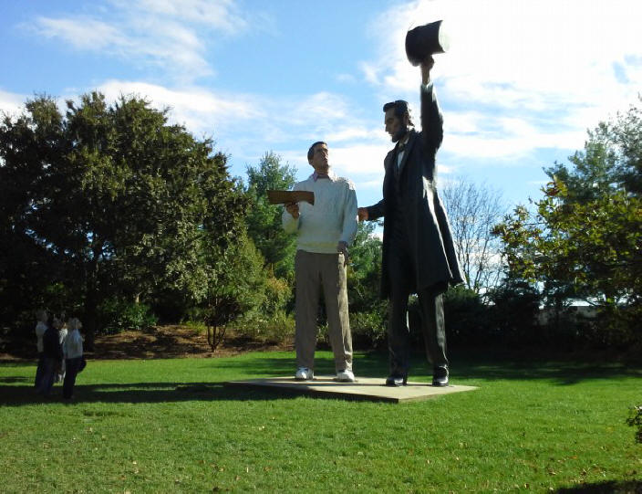 sculpture of larger than life student and teacher at Grounds for Sculpture near Trenton, N.J.