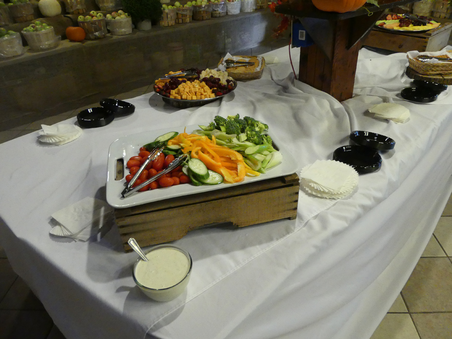 Trays of appetisers wth apple baskets in background at Becker Farms