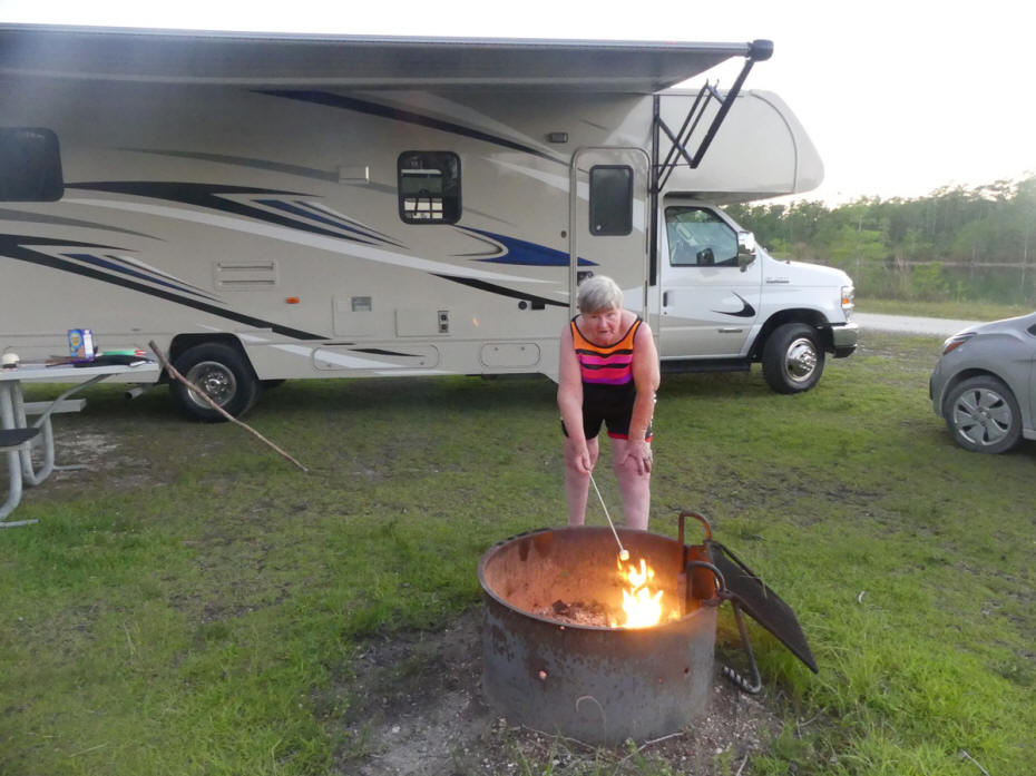 rv at burns lake with me at firepit