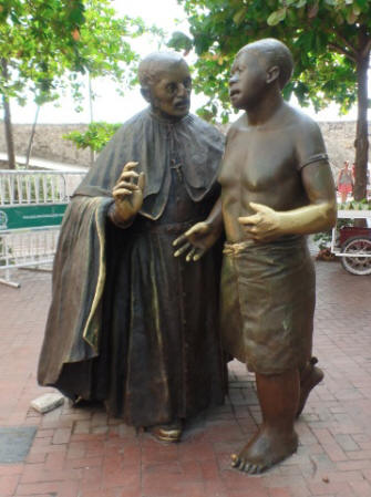 Full view of peter_and_slave sculpture in Cartagenga, Colombia