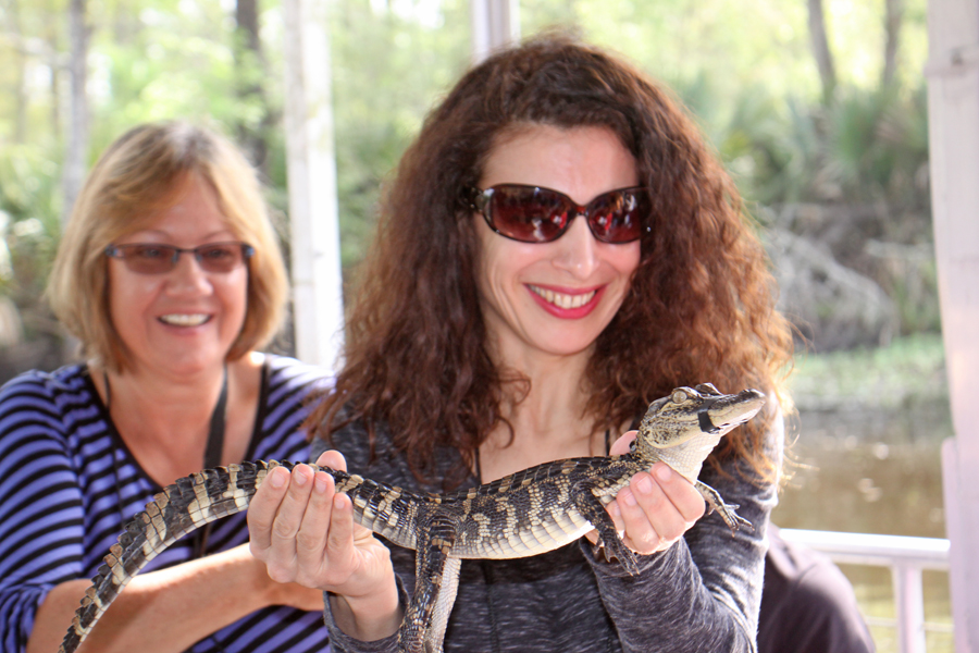 Gina holding a little alligator