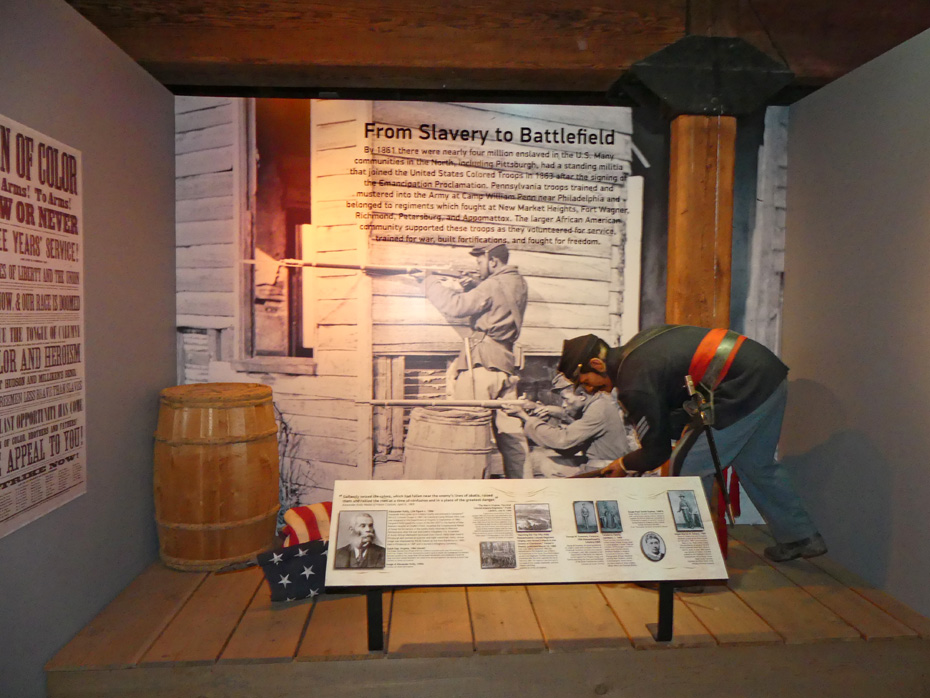 exhibit in Senator John Heinz Musuem in Pittsburgh showing Black Civil War soldier fighting