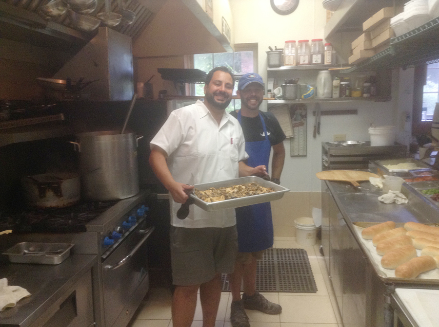 Damino Perillo in kitchen with worker at Perillo's Pizzeria in North Salem, Indiana