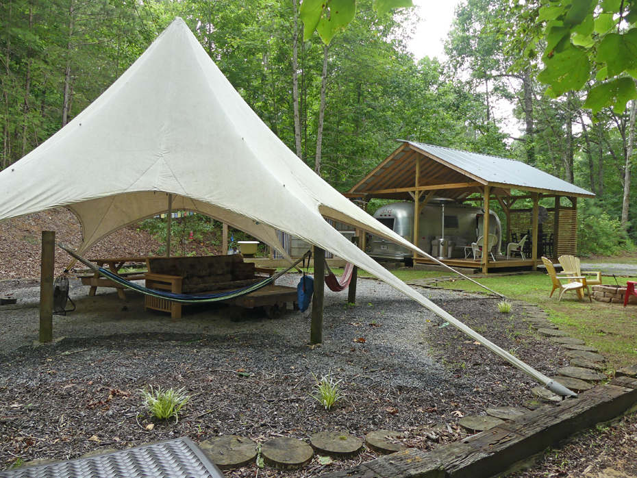 star tent wiht airstream in background