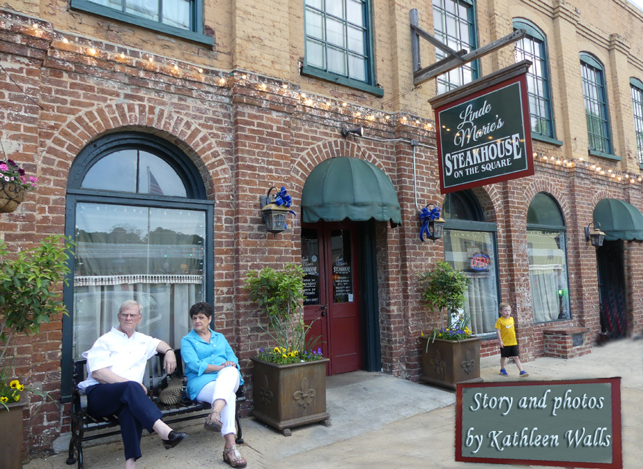 linde marie's steakhouse building wiht couple and little boy in front