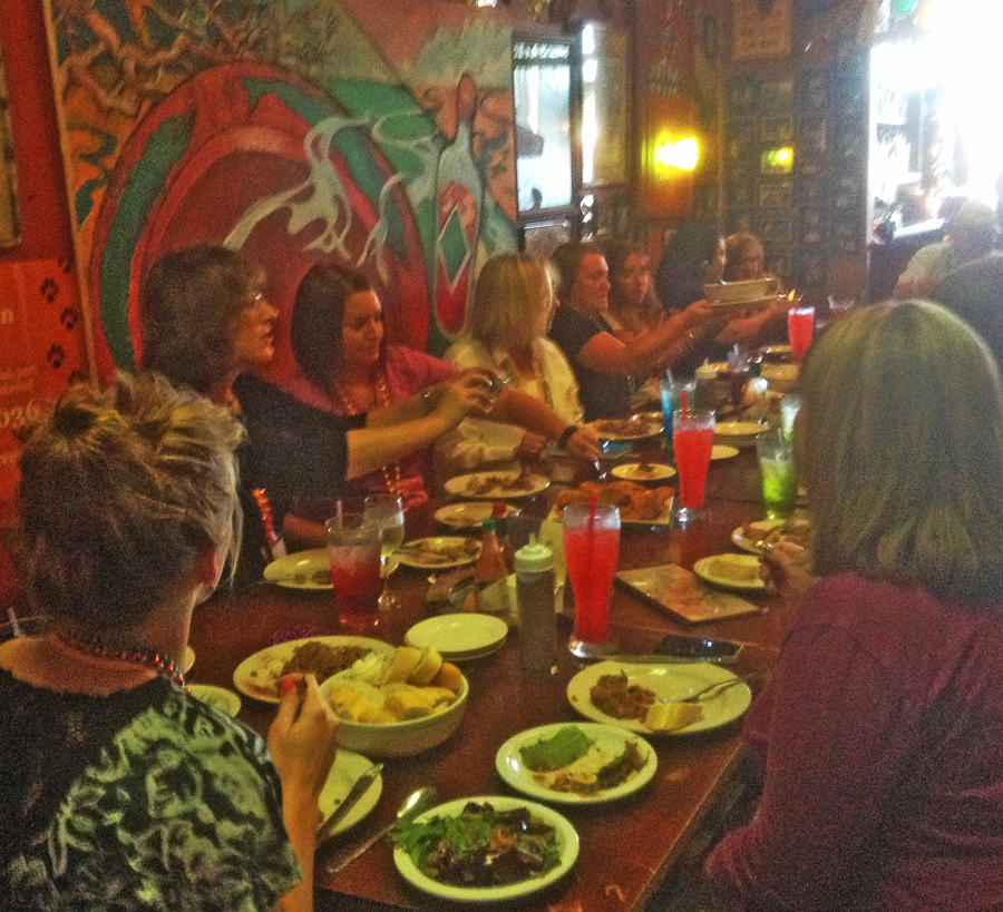 group of people seated at a long table at Zydeco's Restaurant in Mooresville, IN