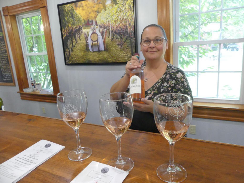 woman serving wine