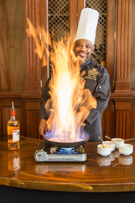 Chef preparing Bananas Foster at Bourbon Orleans in French Quarter of New Orleans