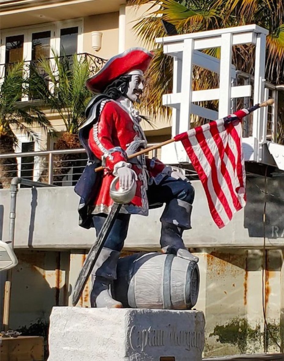 stature of Captain Morgan holding US flag