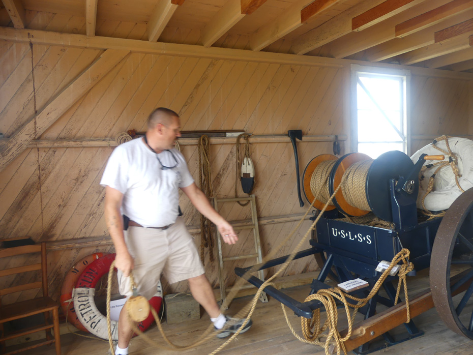 Larry Grubbs displaying rope and life saving equiptment at Chicamacomico Lifesaving Station