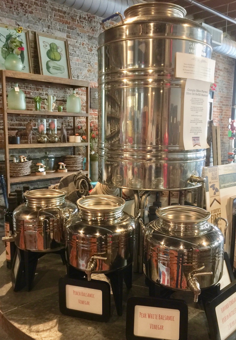 Large and small olive oil containers in restaurant in Valdosta GA