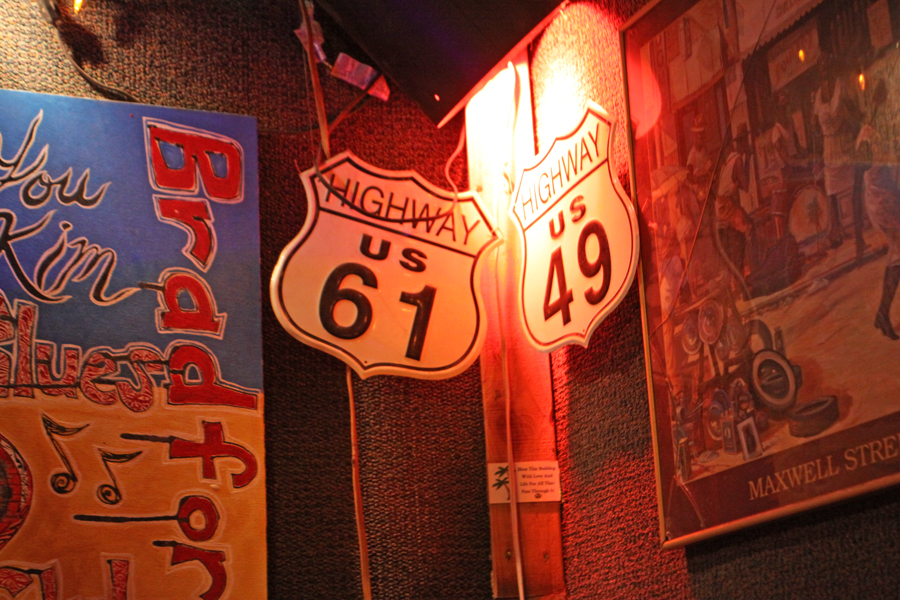 Highway 61 and 49 signs  at Bradfordville Blues Club in Tallahasseeof the Mississippi Crossroad