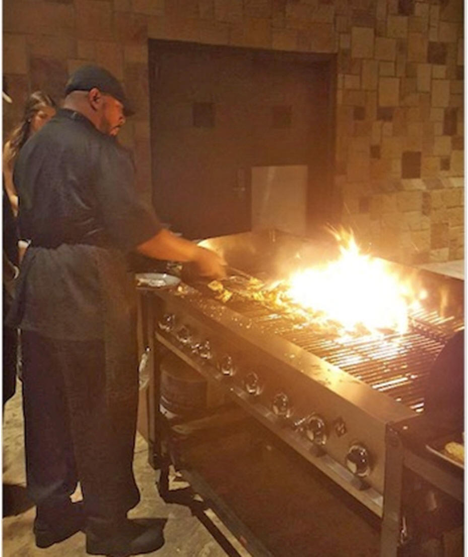 Chef Lyle Broussard at grill