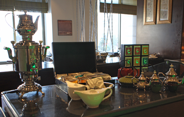 Teapot, bags, cups and silverware