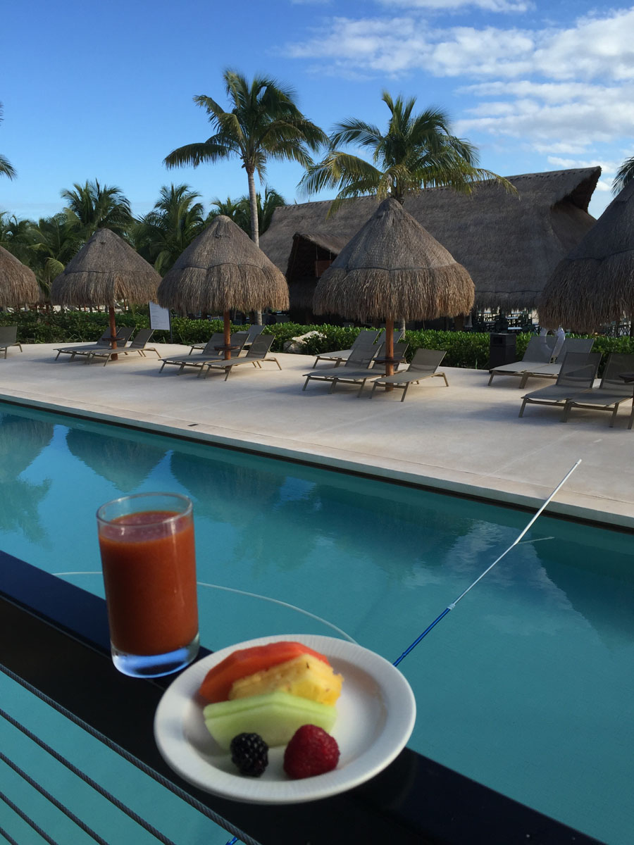 thath umbrellas  and breakfast at poolside at Excellence Resort