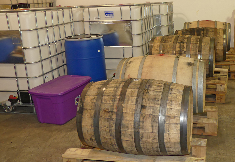 Row of barrels used to make bourbon at Dalton Distillery