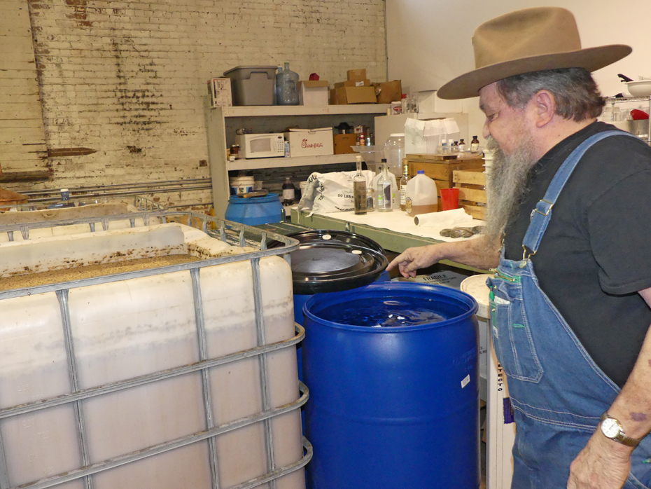 Raymond explains some of the steps n distilling.