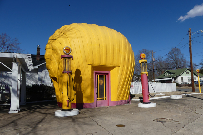 old shell gas station shaped like a shell